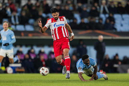 Rodrigao of Crvena Zvezda and Emmanuel Ekong of Malmö FF