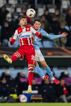 Rade Krunic of Crvena Zvezda and Kenan Busuladzic of Malmö