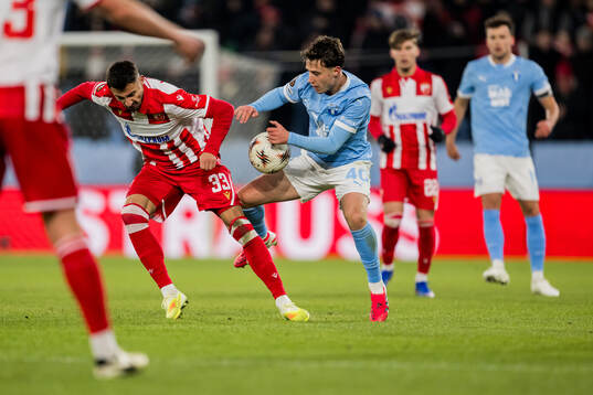 Rade Krunic of Crvena Zvezda and Kenan Busuladzic of Malmö