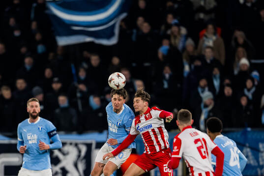 Kenan Busuladzic of Malmö FF and Vasilije Kostov of Crvena