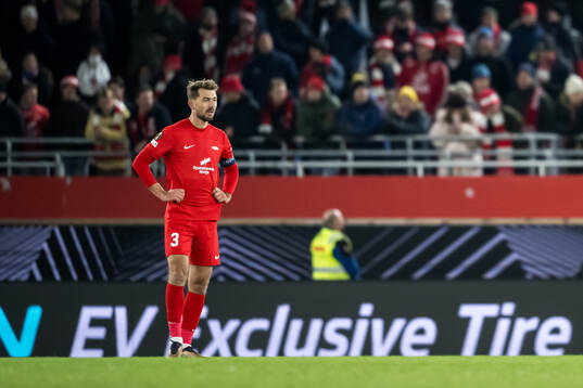 Fredrik Pallesen Knudsen of Brann looks dejected