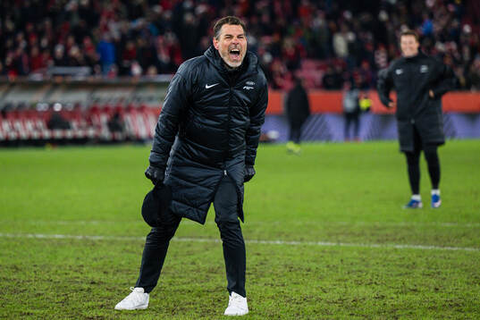 Head coach Freyr Alexandersson of Brann celebrates