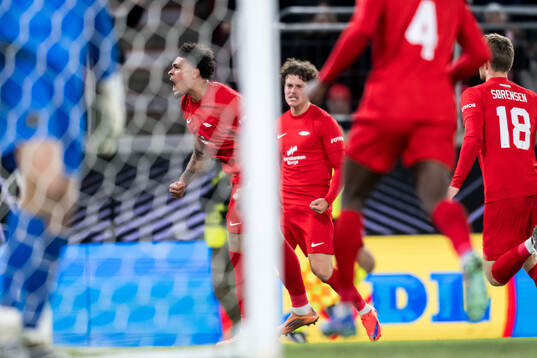 Noah Holm of Brann celebrates