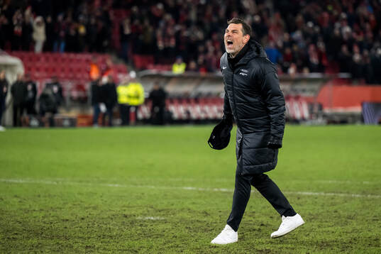 Head coach Freyr Alexandersson of Brann celebrates
