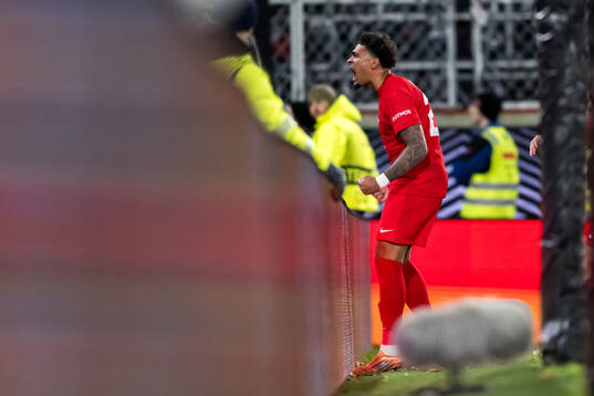 Noah Holm celebrates
