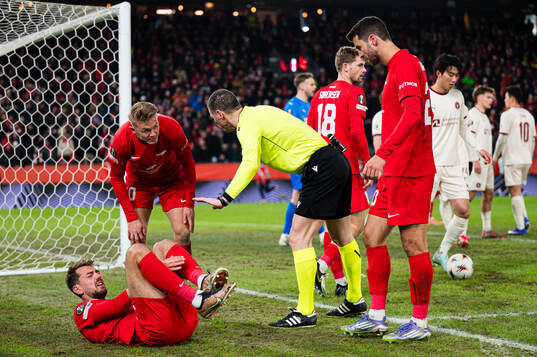Fredrik Pallesen Knudsen of Brann in pain