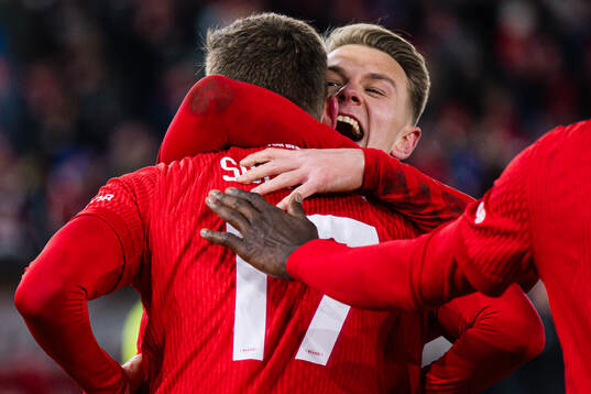 Joachim Soltvedt of Brann celebrates with Emil Kornvig