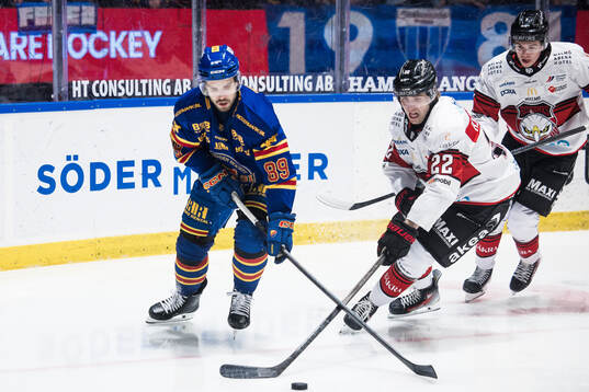 Djurgårdens Oula Palve och Malmö Redhawks Janne Kuokkanen