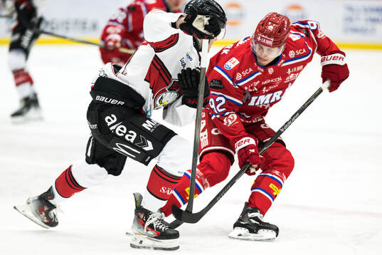 Malmö Redhawks Janne Kuokkanen och Timrås Anton Lundmark