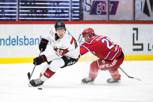 Malmö Redhawks Robin Salo och Timrås Anton Heikkinen