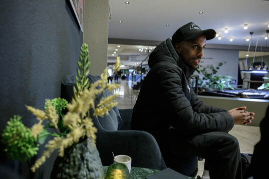 Taha Ali of Malmö FF is interviewed at the hotel