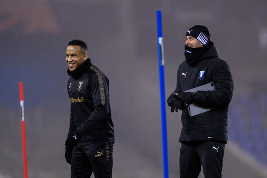 Martin Olsson and Head coach Miguel Angel Ramirez
