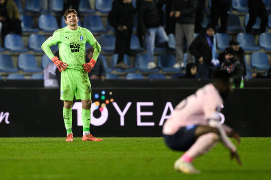 Goalkeeper Melker Ellborg of Malmö FF looks dejected