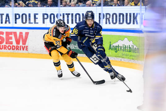 Luleås Oskari Laaksonen och HV71s Joona Luoto