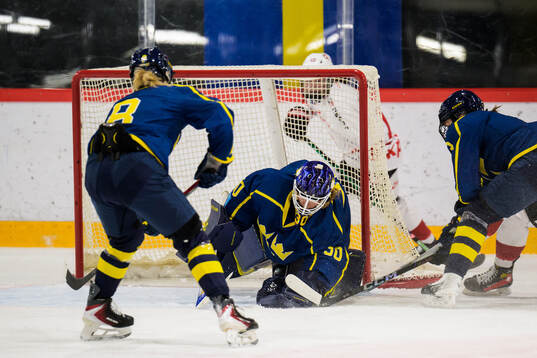 Goaltender Emma Söderberg of Sweden makes a save in a
