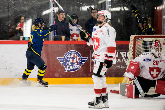 Hilda Svensson and Thea Johansson of Sweden celebrate the