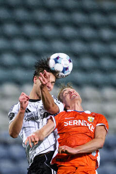 Håkon Volden of Rosenborg and Max Fenger of IFK Göteborg