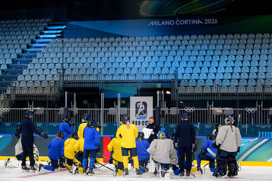 Players of Sweden at a ice hockey practice session