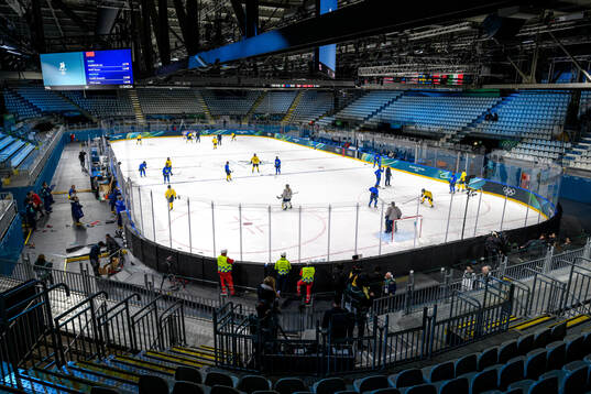 View from the stands at a ice hockey practice session with