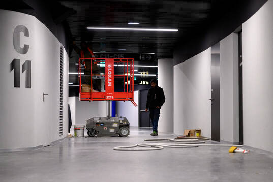 Construction workers are working to complete the Milano