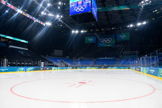 Parts of the ice in the Milano Santagiulia Ice Hockey Arena