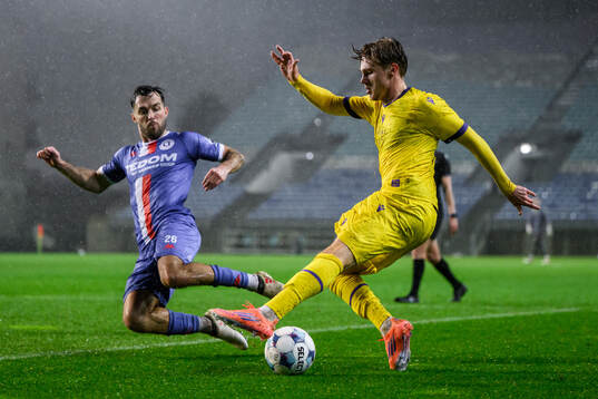 Martin Pospisil of Artis Brno and Jeppe Kjaer of Mjällby