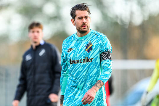 Goalkeeper Kristoffer Nordfeldt of AIK looks dejected