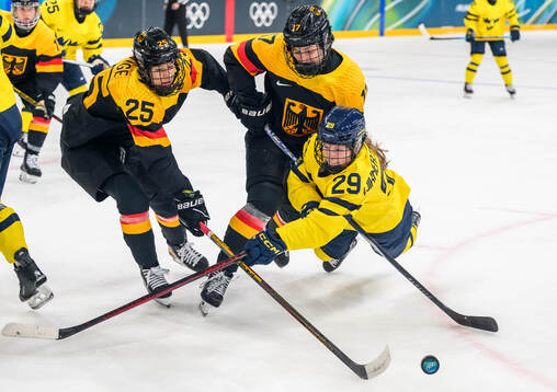 Laura Kluge and Emily Nix of Germany against Felizia Wikner