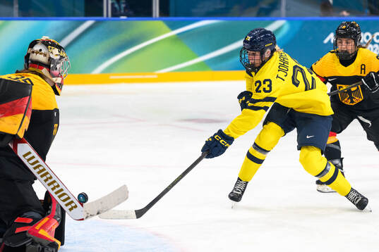 Thea Johansson of Sweden scores the 4-1 goal behind