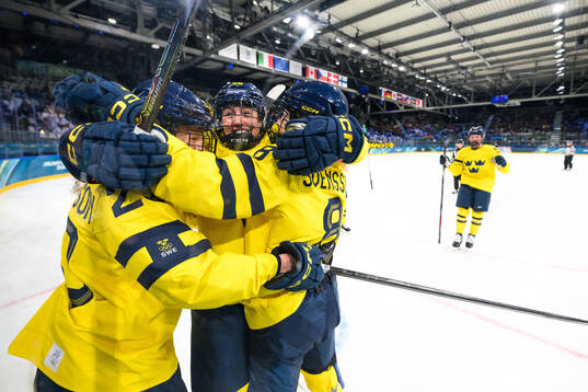 Thea Johansson and Hanna Olsson of Sweden celebrate the 4-1