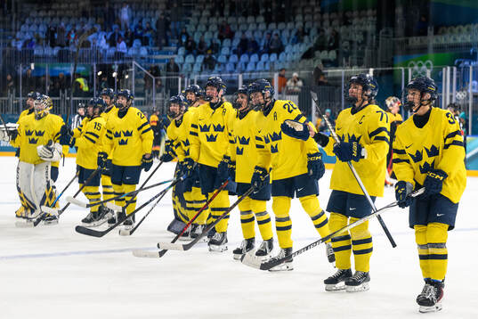 Players of Sweden celebrate