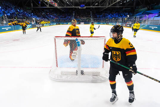 Goaltender Sandra Abstreiter and Celina Haider of Germany