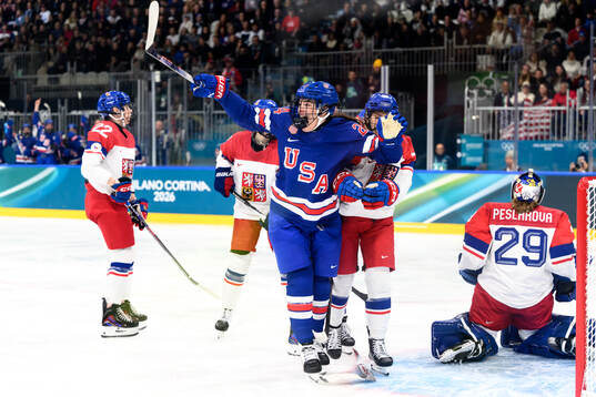 Joy Dunne of USA celebrates