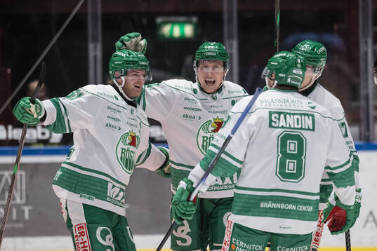Rögles Calle Själin och Paul Ladue jublar