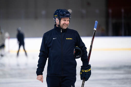 Assistant coach Stefan Ladhe of Sweden at a ice hockey