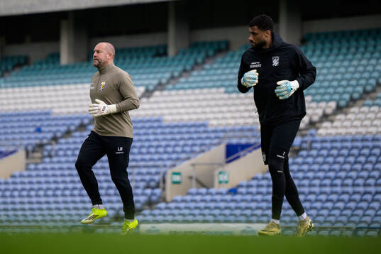 Goalkeeper coach Lee Baxter and Goalkeeper Jonathan Rasheed