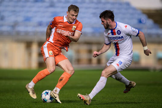 David Kruse of IFK Göteborg and Daniel Samek of Artis Brno
