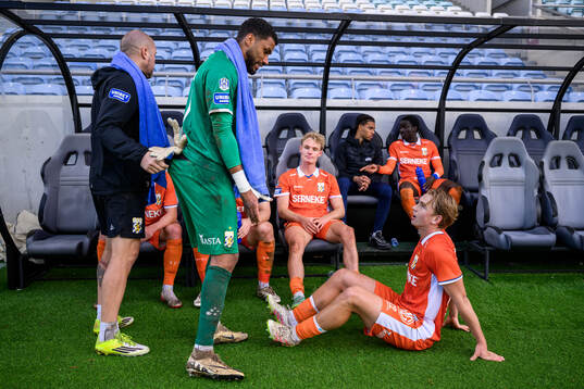 Goalkeeper coach Lee Baxter, goalkeeper Jonathan Rasheed