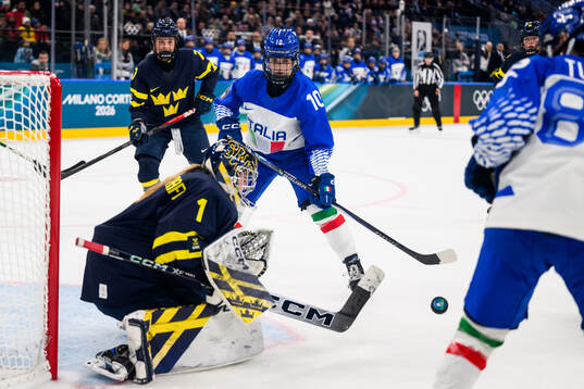 Aurora Abatangelo of Italy against goaltender Ebba Svensson