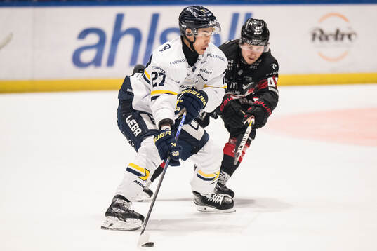 HV71s Jonathan Ang och Malmö Redhawks Robin Salo