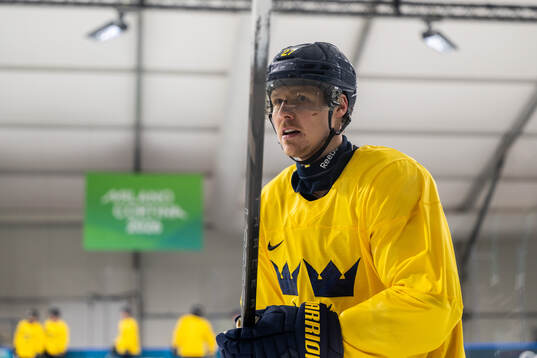 Hampus Lindholm of Sweden at an ice hockey practice session