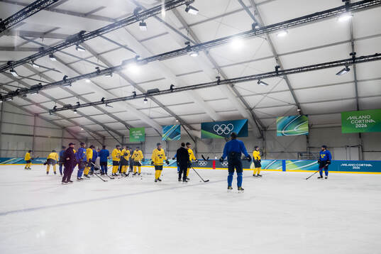 Players of Sweden at an ice hockey practice session