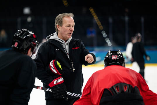 Head coach Jon Cooper of Canada at an ice hockey practice
