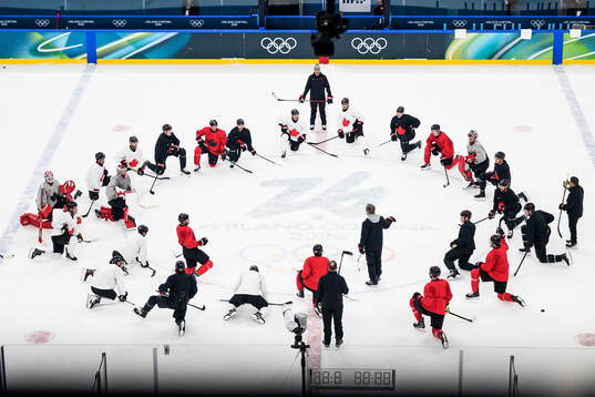 Players of Canada at an ice hockey practice session