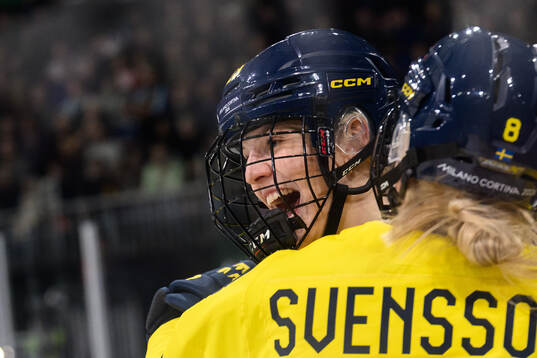Thea Johansson and Hilda Svensson of Sweden celebrate the