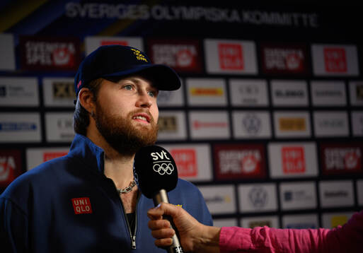 William Nylander is interviewed at a press conference with