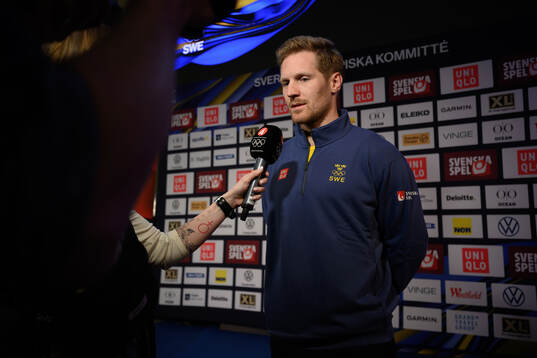 Gabriel Landeskog is interviewed at a press conference with