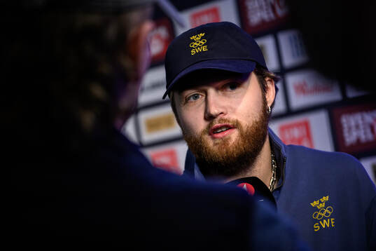 William Nylander is interviewed at a press conference with