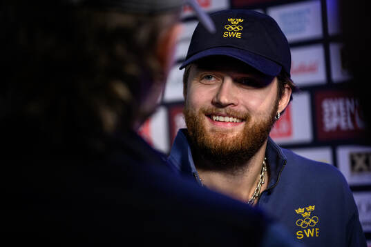 William Nylander is interviewed at a press conference with