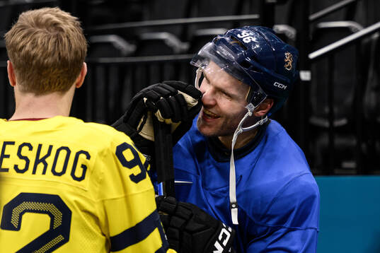 Gabriel Landeskog of Sweden and Mikko Rantanen of Finland